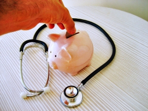 Stethoscope and Piggy Bank via 401(K) 2012 via Flickr